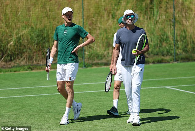 Darren Cahill, right, believes Sinner is improving on grass as he bids for Wimbledon glory