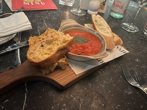 Scarpetta Con Pomodoro Di San Marzano (sweet tomato and garlic sauce with freshly baked sourdough bread).
