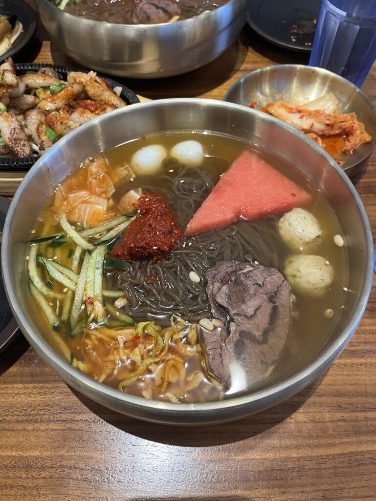 Naengmyeon (Korean cold noodles) & marinated grilled pork jowl from Guk Su Jip (Murray Hill, Queens)