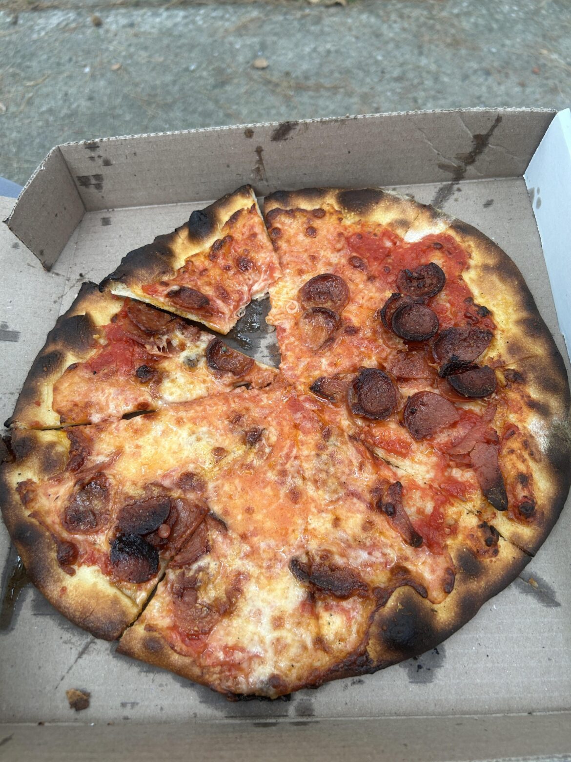 Not OP. I chose mistreated because this place has a big reputation, and this pizza is wholly inexcusable. No, My beef would not be with the char, but with the way it's topped. I say Frank Pepe's is guilty of a a crime against pizza.