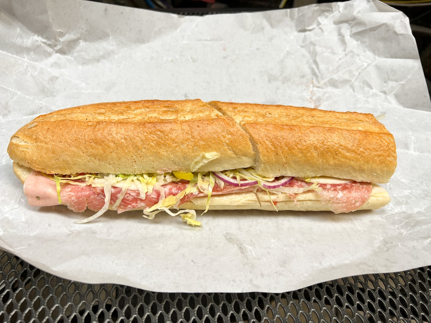The Italian sandwich at Bricco Salumeria in the North End: mortadella, Genoa salami, soppressata, provolone, lettuce, tomato, onion, hot peppers, olive oil, vinegar, and oregano.