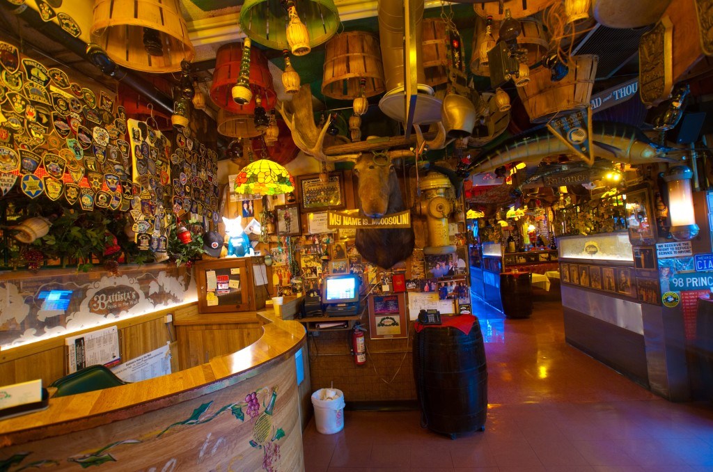 The interior of a restaurant with a lot of memorabilia