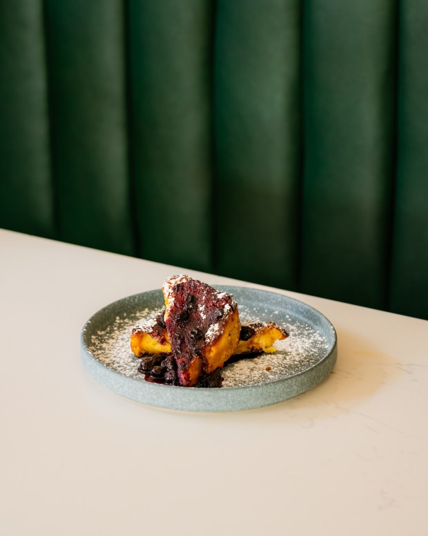 In Doughnut Bread Pudding With Blueberry Compote, the mild sweetness of the bread pudding allows the bright and flavorful Blueberry Compote to shine. (Hotel Forty Five)