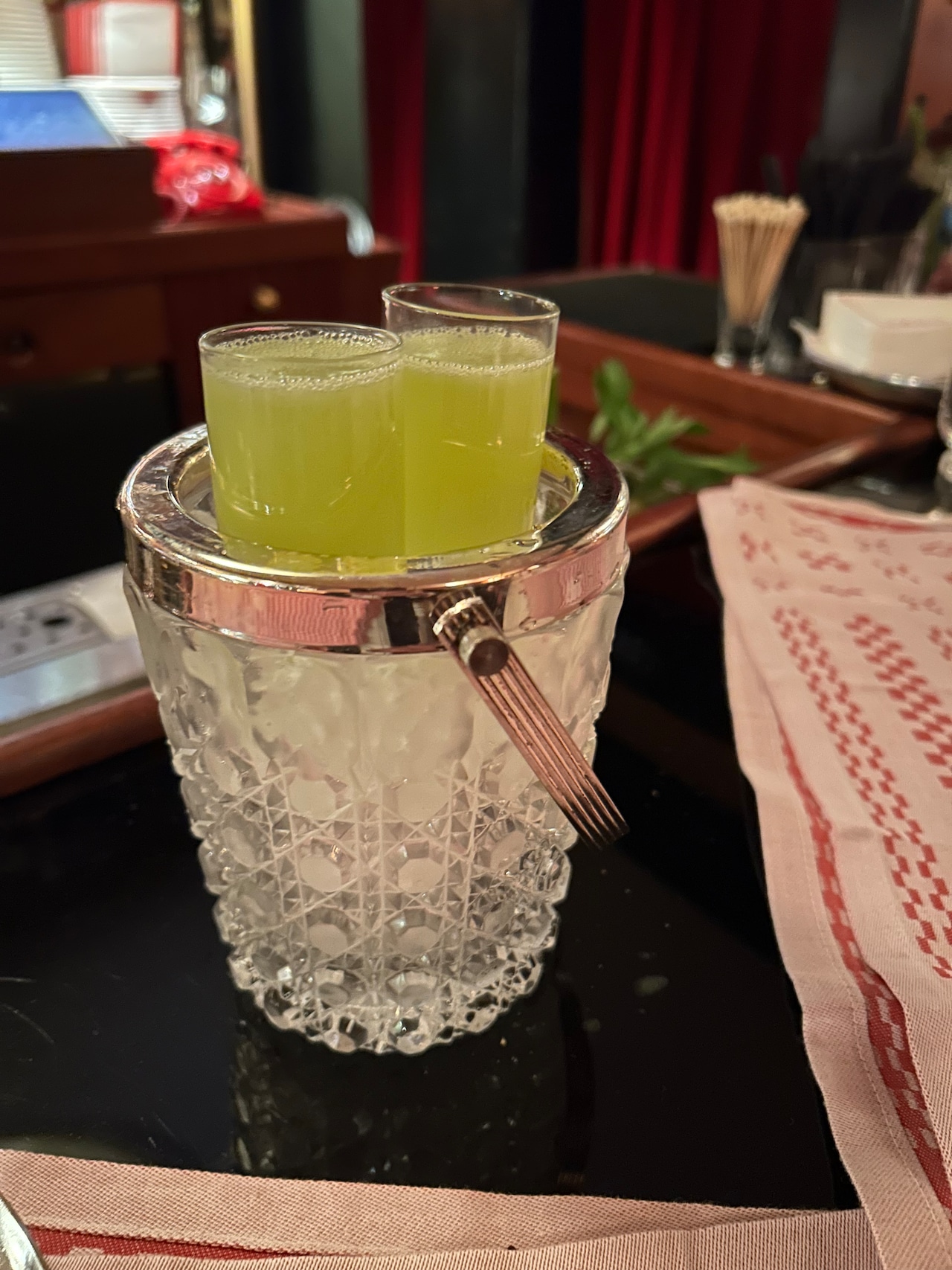 The trou Normand, or "Norman hole," a digestif made from blanche Armagnac and fresh-squeezed green apple juice, is designed to help make room for dessert.