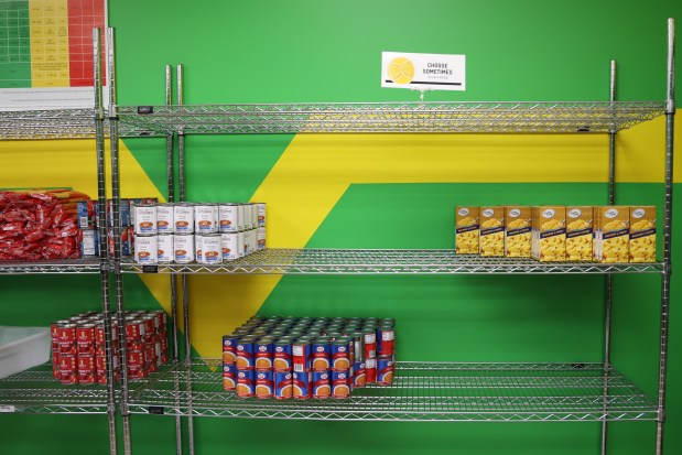 Sparse shelves at the St. Sabina parish food pantry in Chicago, June 30, 2025. (Antonio Perez/Chicago Tribune)