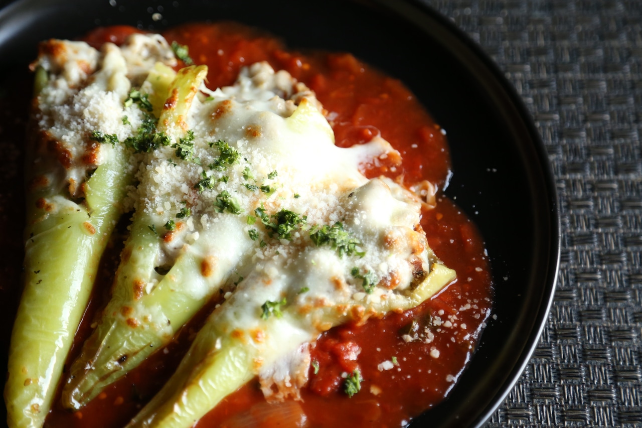 Corleone’s Ristorante in Parma has scheduled an Italian wine dinner, pairing some good vino with several dishes. (This dish is off the regular menu, hot banana peppers stuffed with ground veal, sausage and Fontina and house marinara.)
