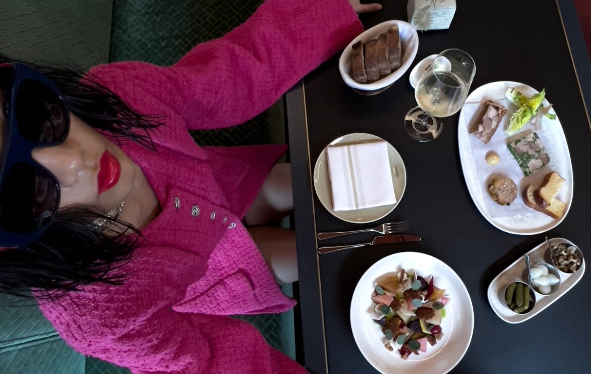 A model having dinner at a French restaurant