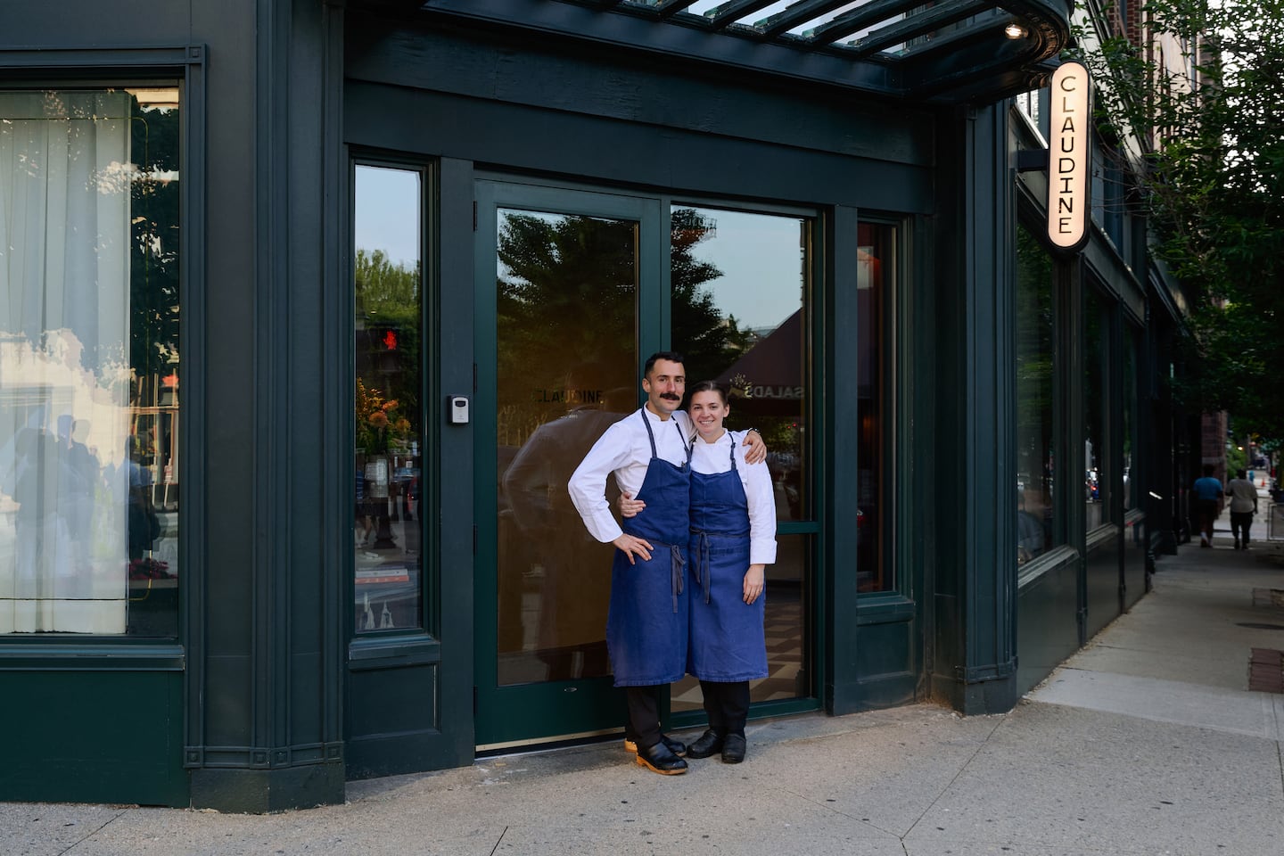 Chefs and co-owners Josh Finger and Maggie McConnell in front of their restaurant Claudine in downtown Providence, R.I.