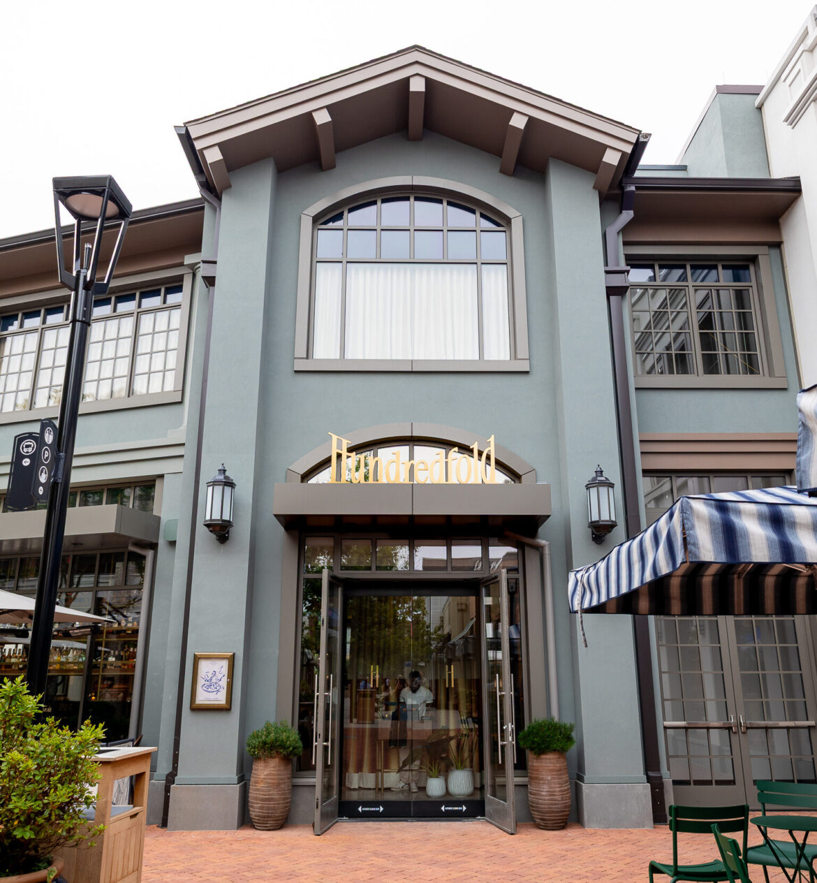 Patina Group’s Hundredfold brasserie brings whimsy and flavor to Belmont Park Village