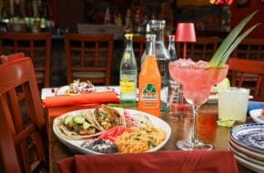 Table with Mexican food and drinks at Red Agave in Monroe Township