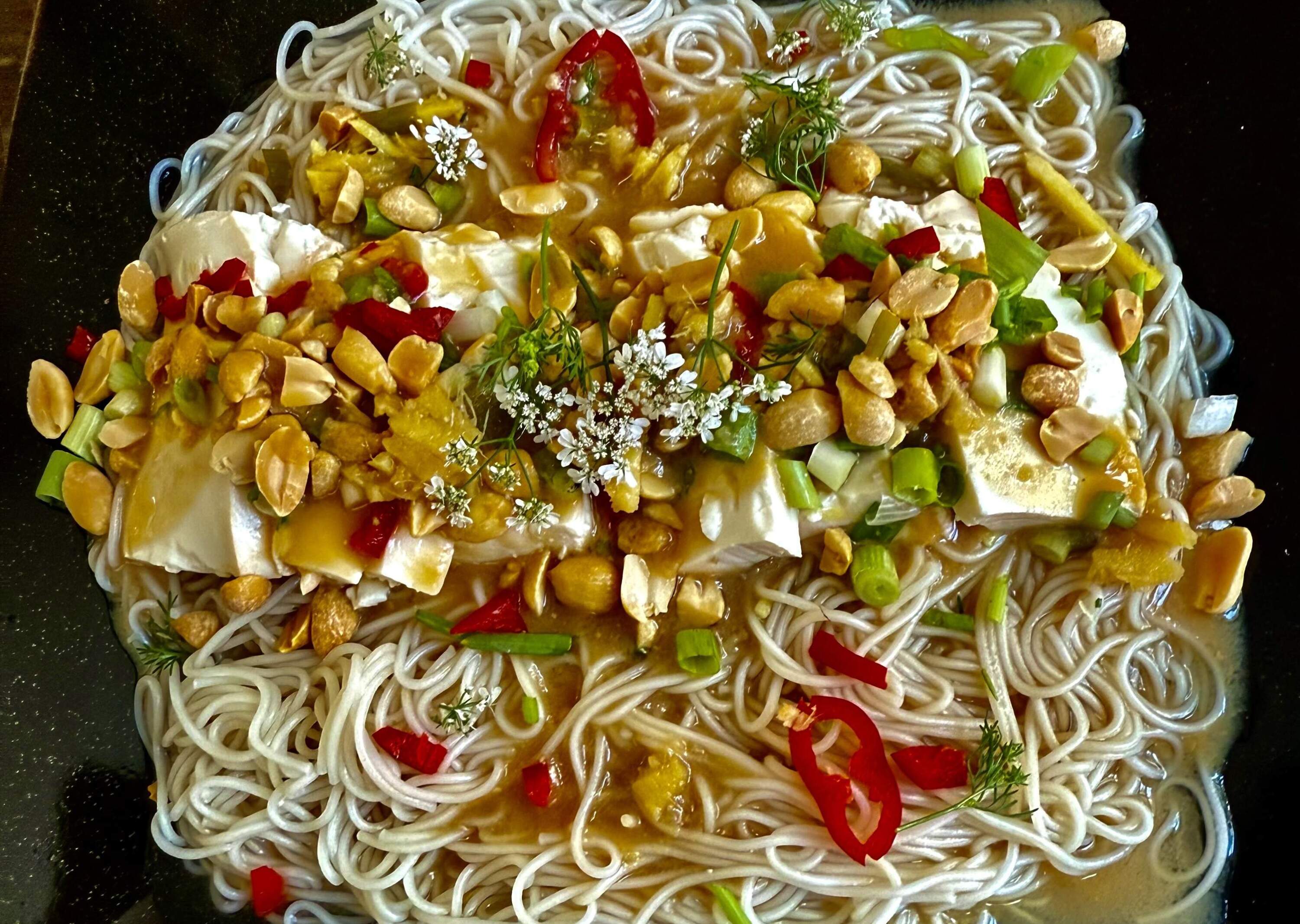 Japanese cold noodles with miso sauce, tofu, ginger and peanuts. (Kathy Gunst/Here & Now)