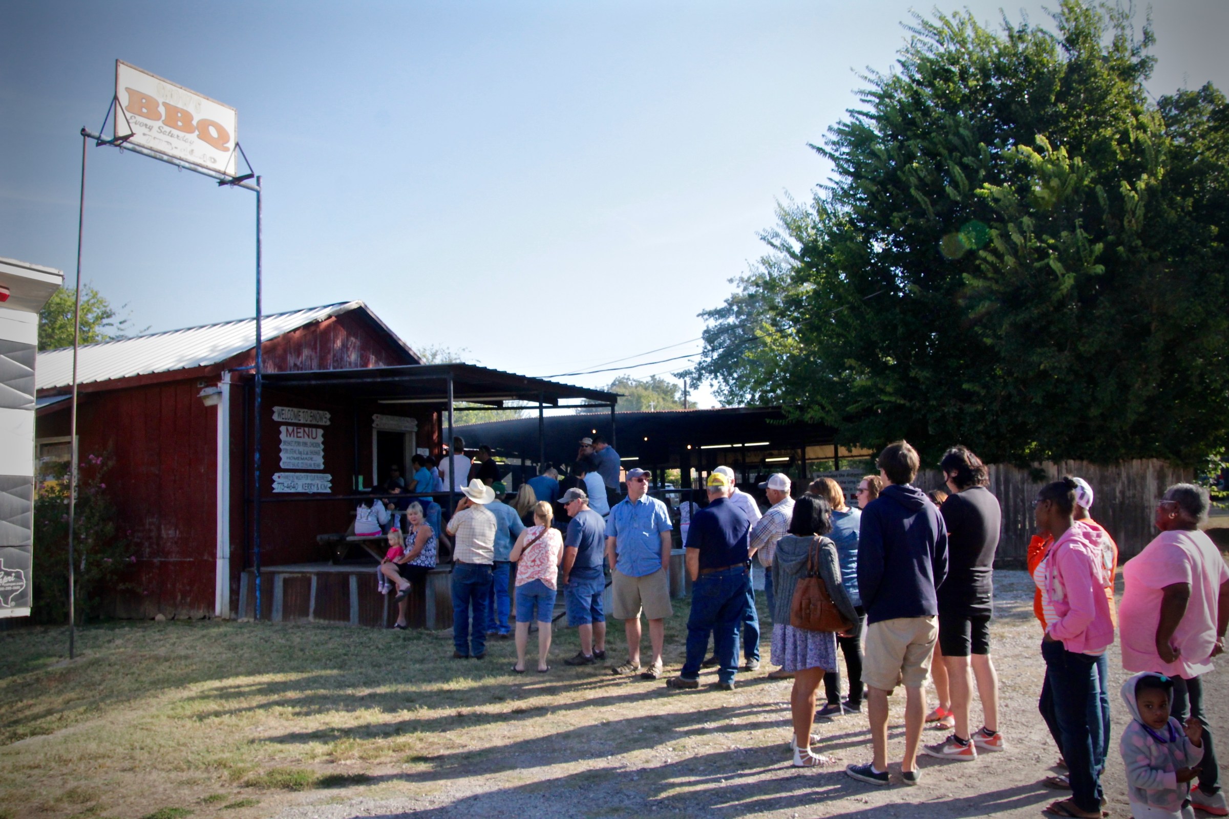 People wait in line at a Texas barbecue spot called Snow’s.