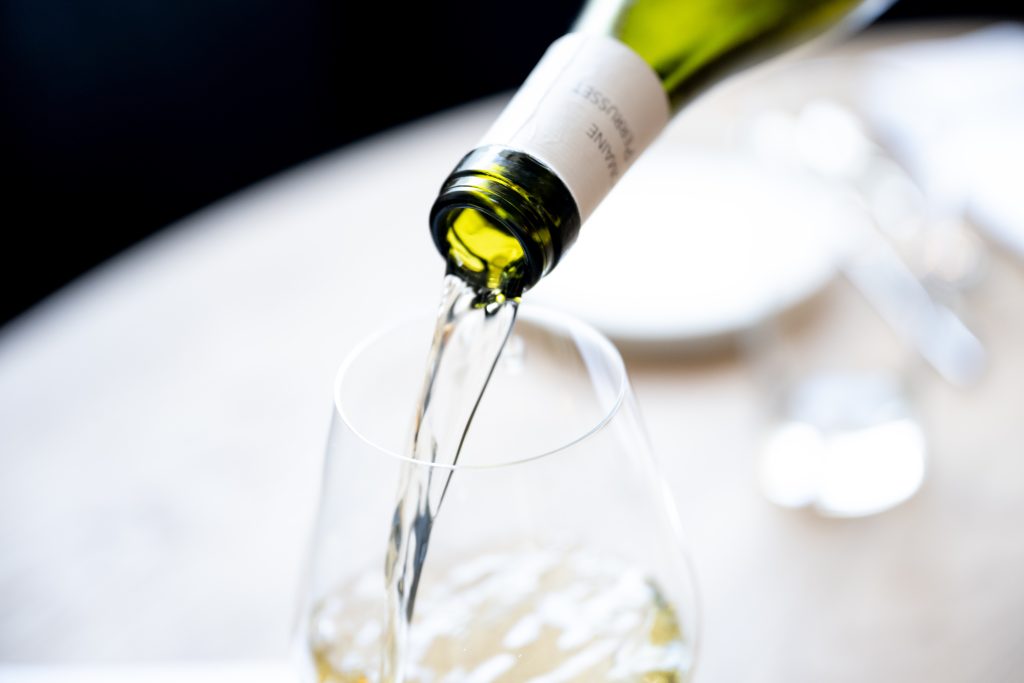 Pouring wine into glass