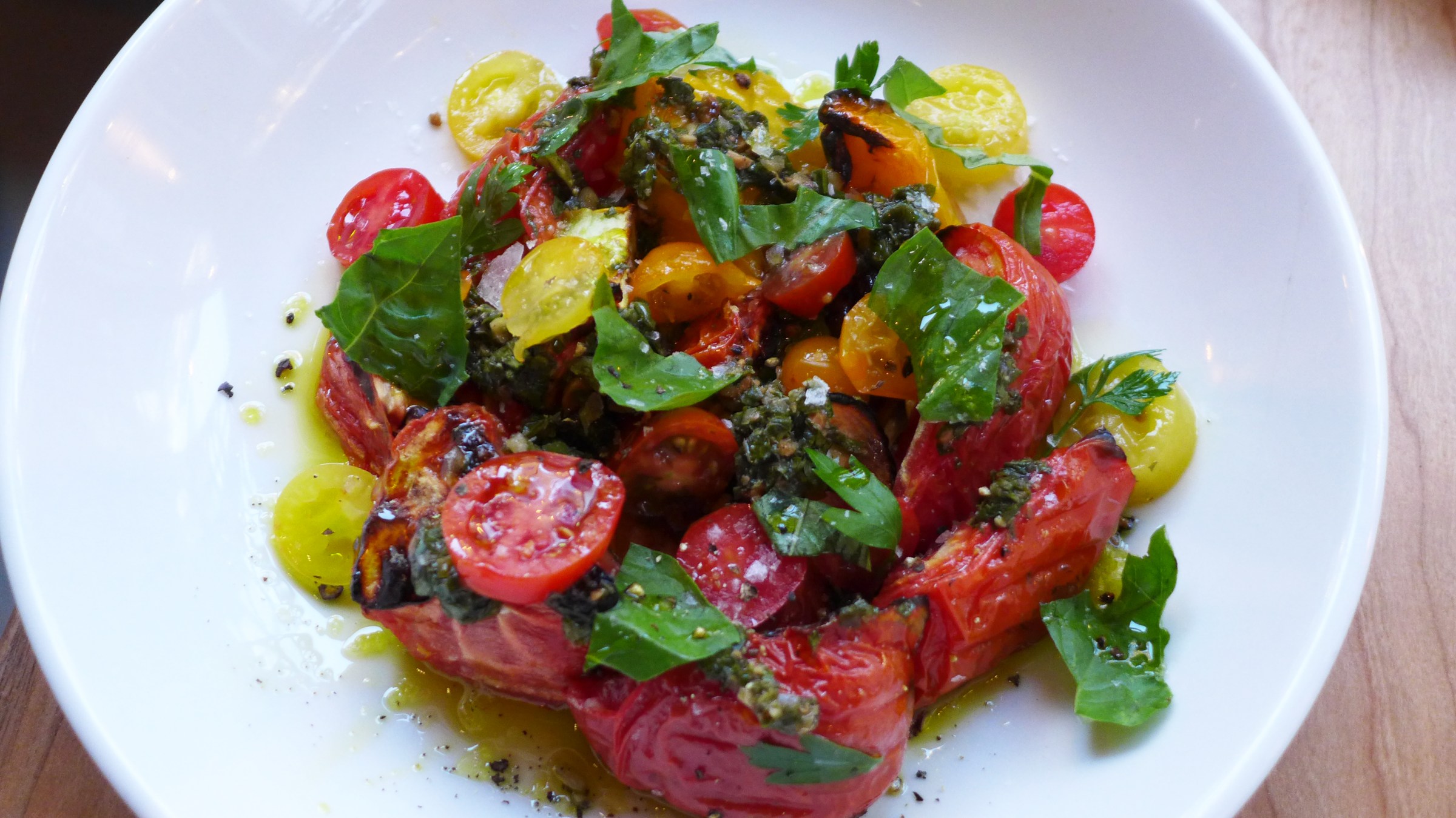 Yellow and red tomatoes of varying sizes.