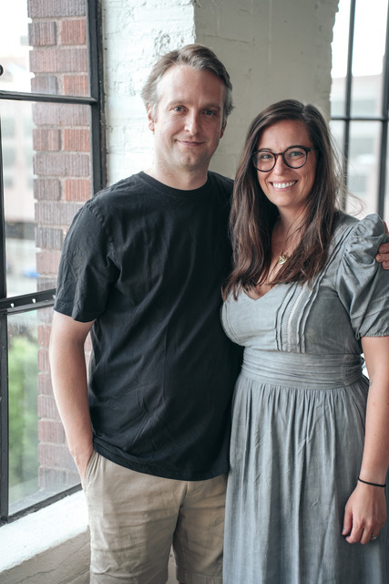 a couple smiles for the camera