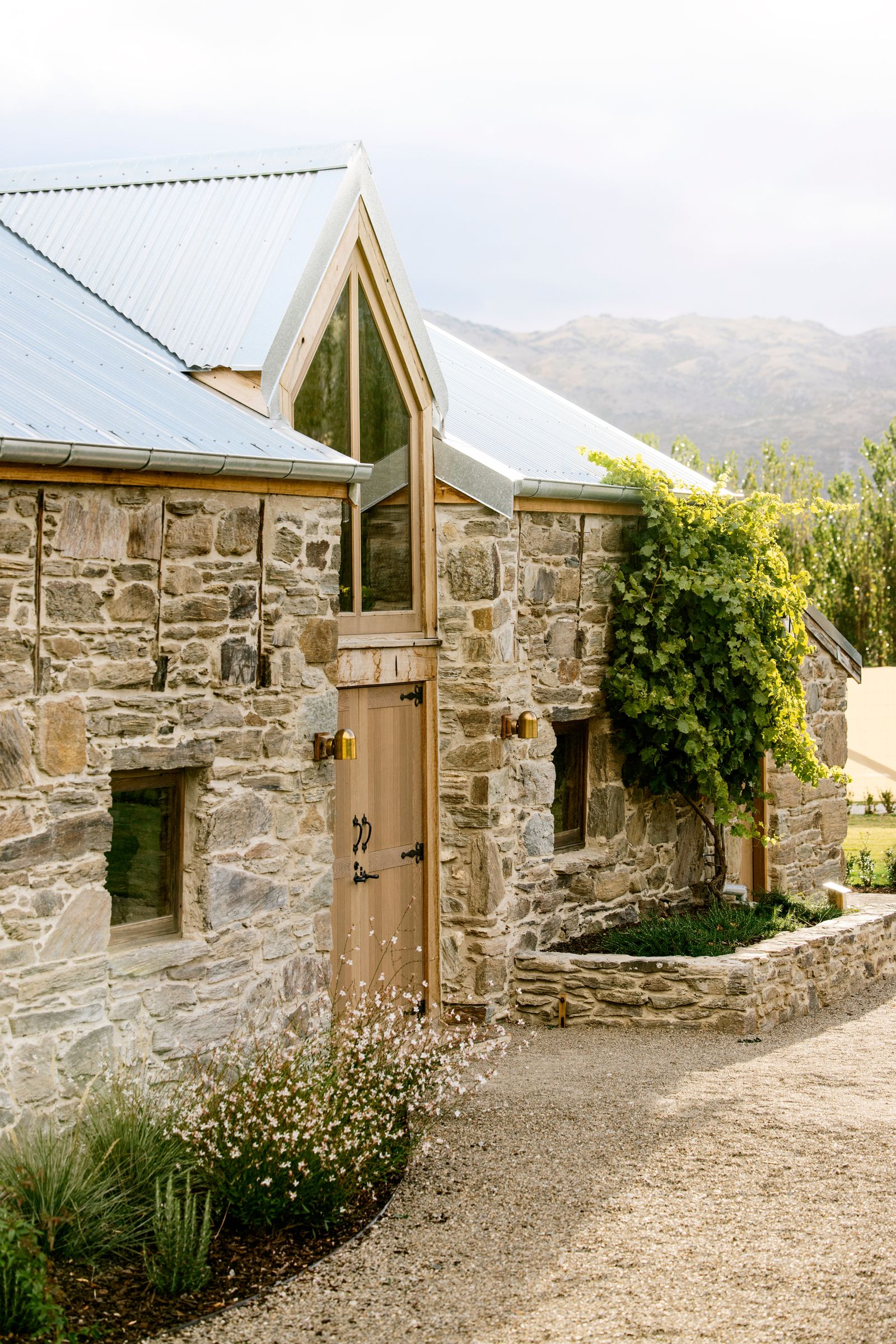Image may contain Path Architecture Building Cottage House Housing Walkway Road Cobblestone and Outdoors
