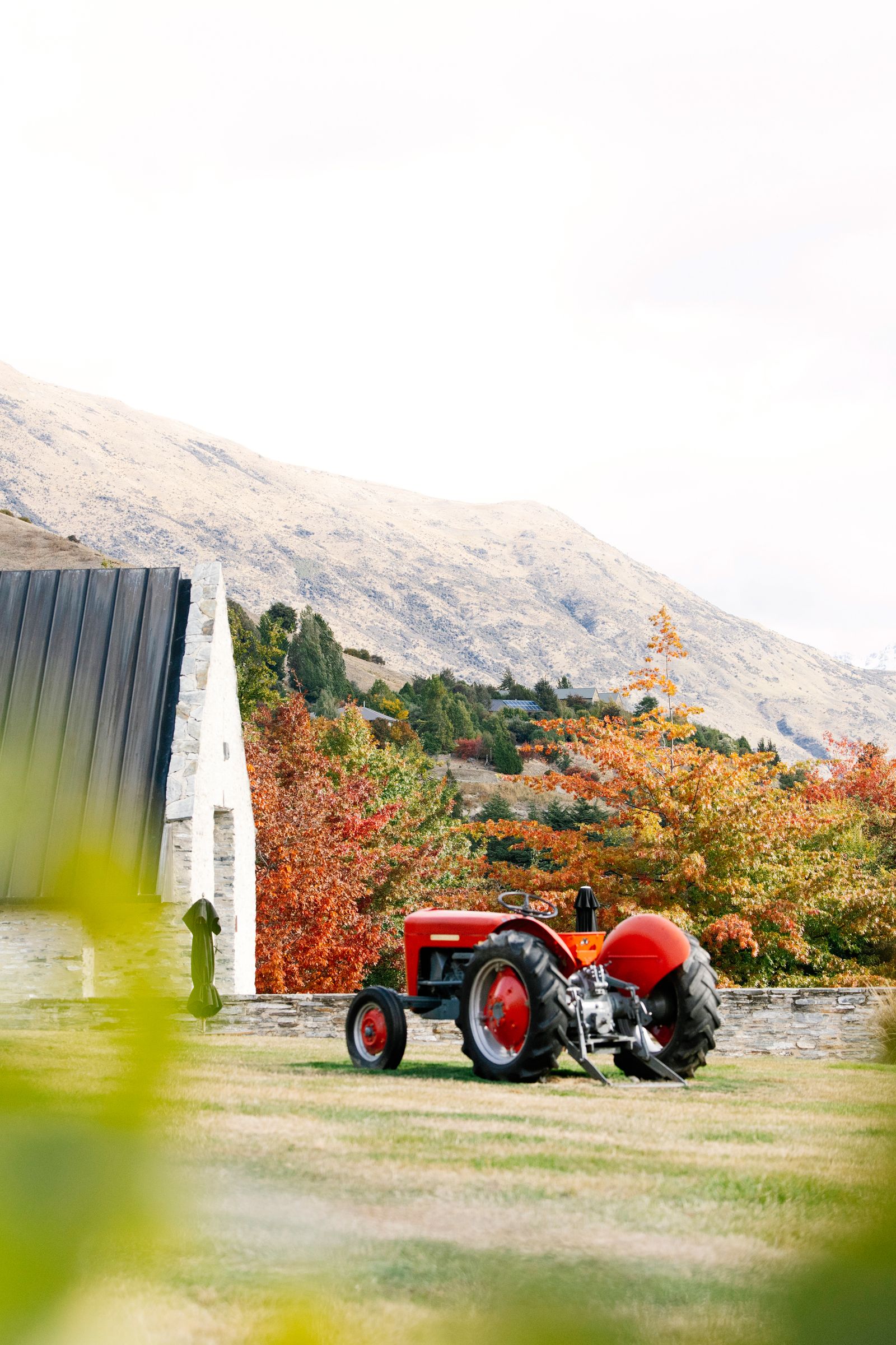 Image may contain Architecture Building Outdoors Shelter Grass Plant Tree Nature Countryside Machine and Wheel