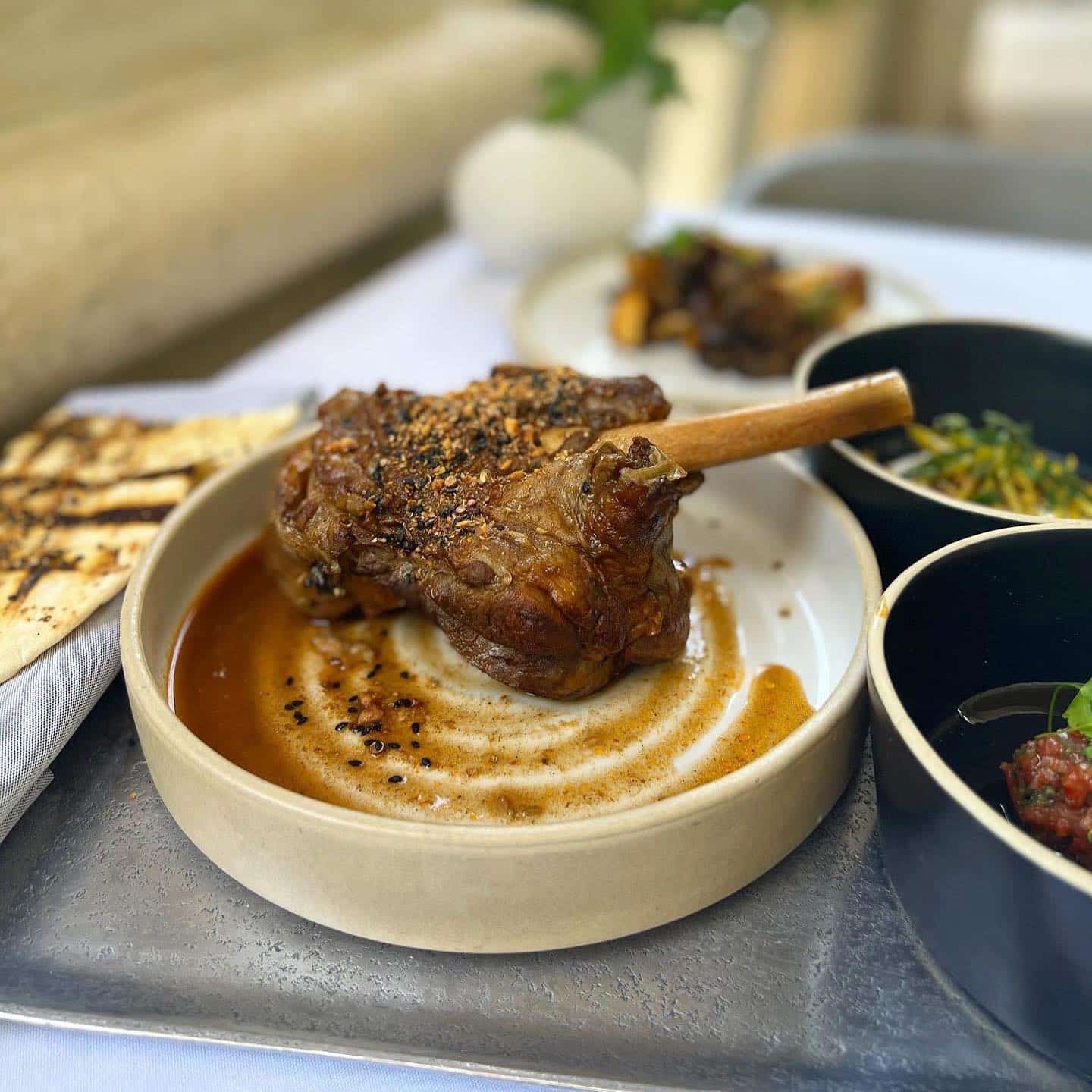 Upscale Mediterranean Restaurant in Coral Gables: TUR Kitchen - leg of lamb