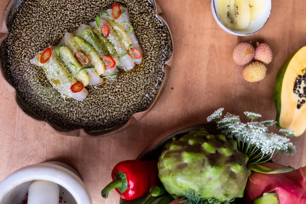 Food dishes from Chef Lay Alston (Yaya’s Crib) who is hosting a studio dinner at San Diego pottery studio Tao of Clay in Barrio Logan