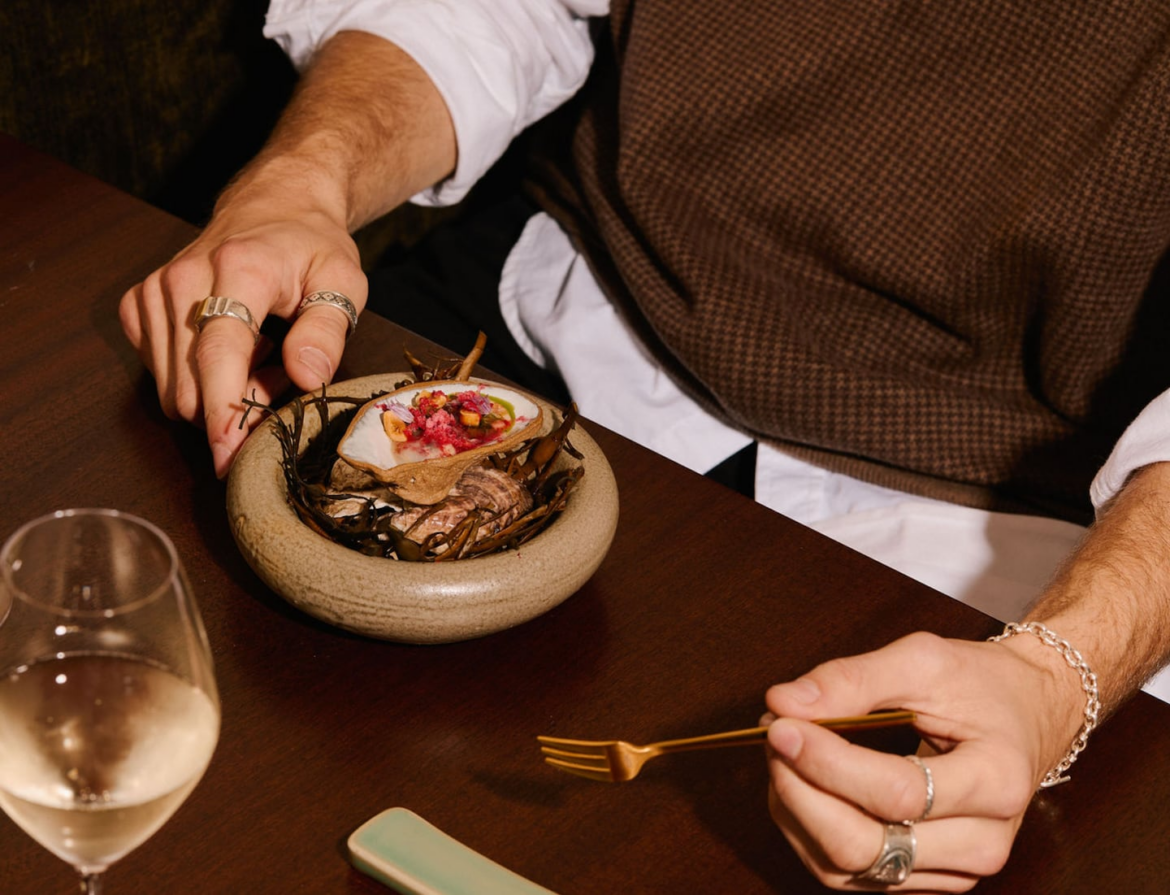 Is Rhode Island ready for a fine dining comeback? A diner eats an oyster at Claudine, a new fine-dining restaurant in Providence, Rhode Island.