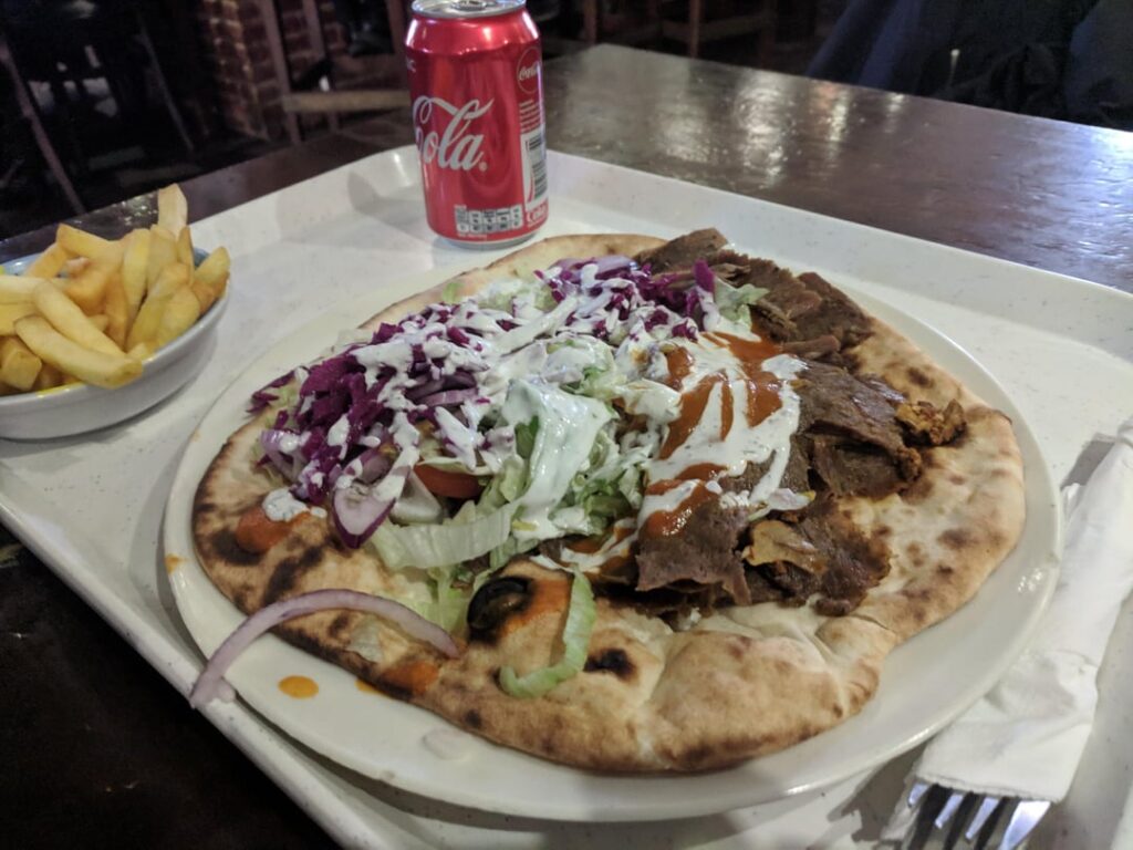 Where can I find a great shawarma on flatbread, where they bake it on site