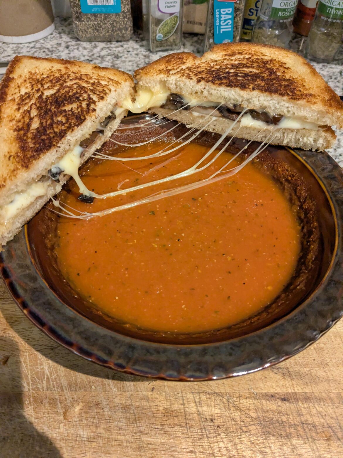 Homemade tomato soup, portobello melt