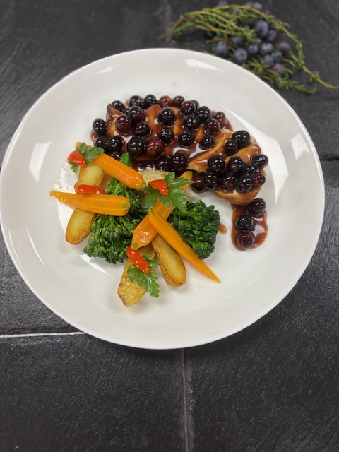 Blueberry Balsamic Chicken is a creative use of blueberries in a savory dish. (Luminary Hotel and Co.)