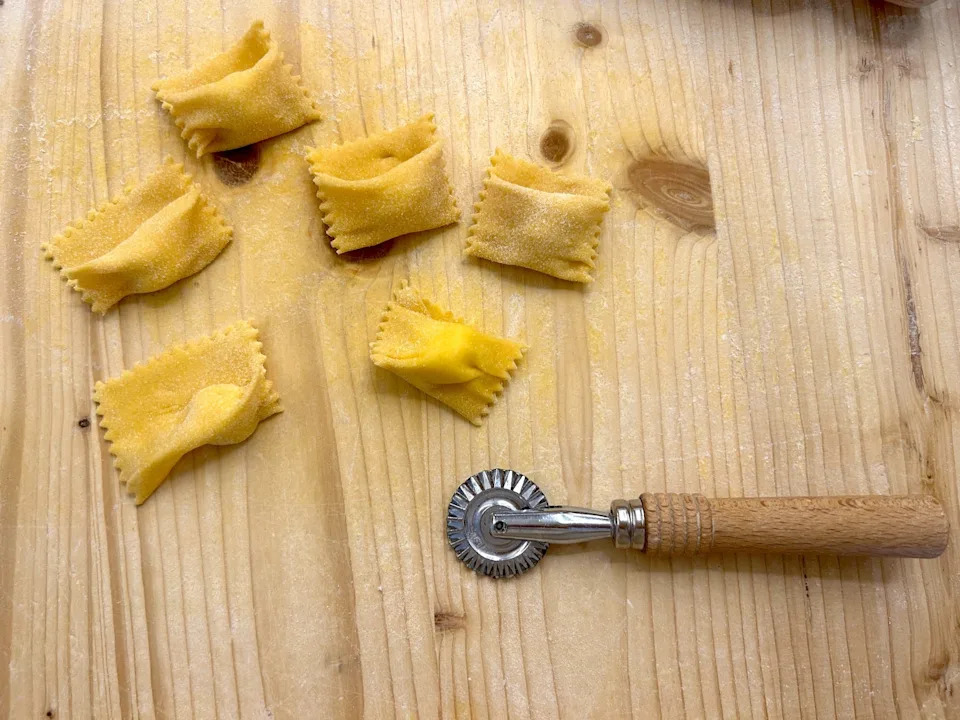 Making homemade pasta at Florence pasta class