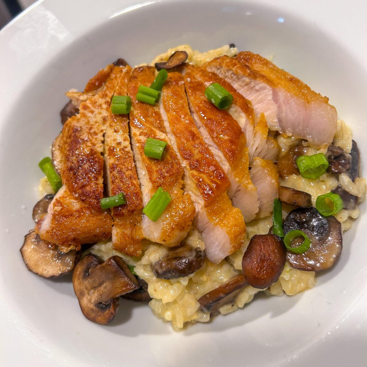 Pork Loin over Mushroom Parm Risotto