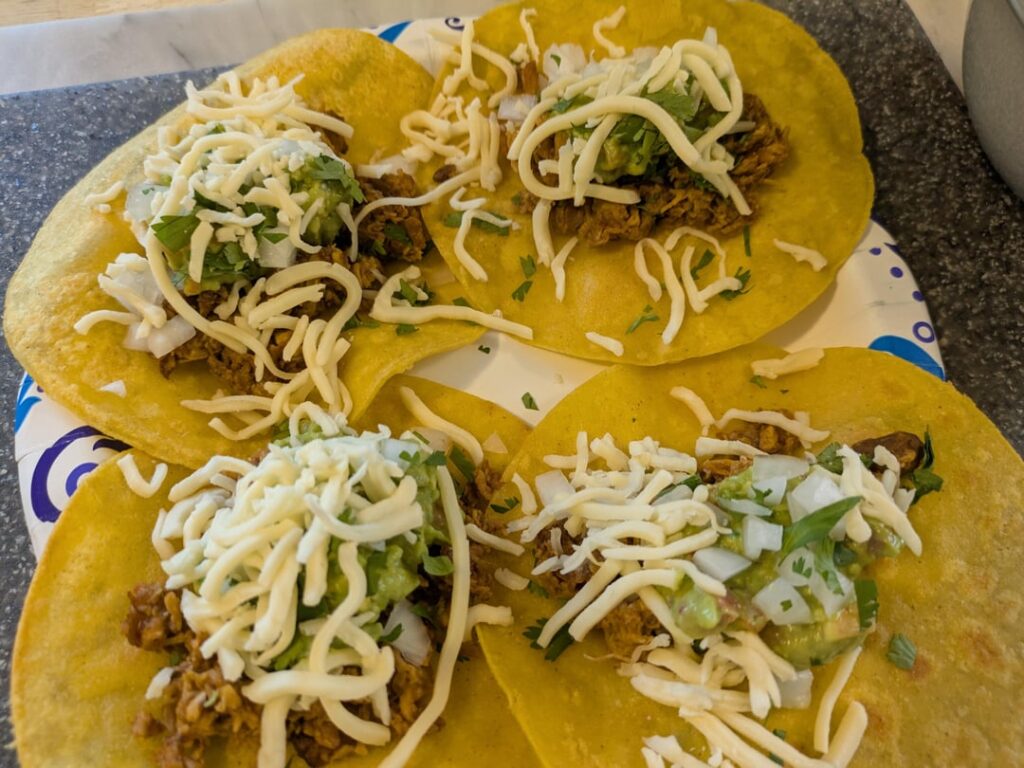 Carnitas, guacamole, onion, cilantro and Chihuahua cheese.