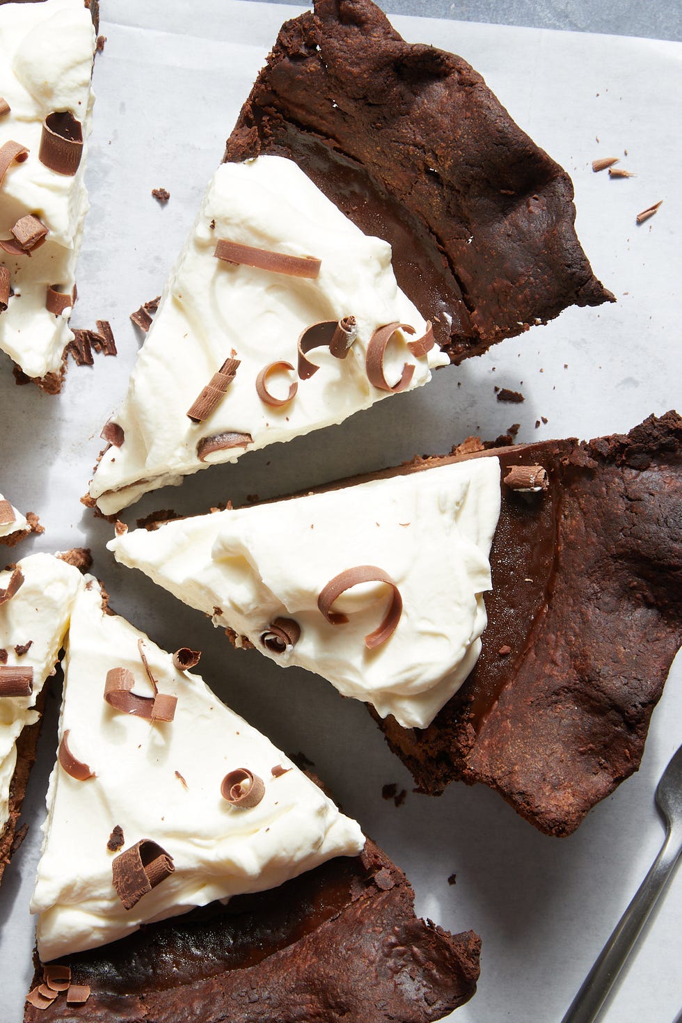 chocolate pie with whipped cream and chocolate shavings