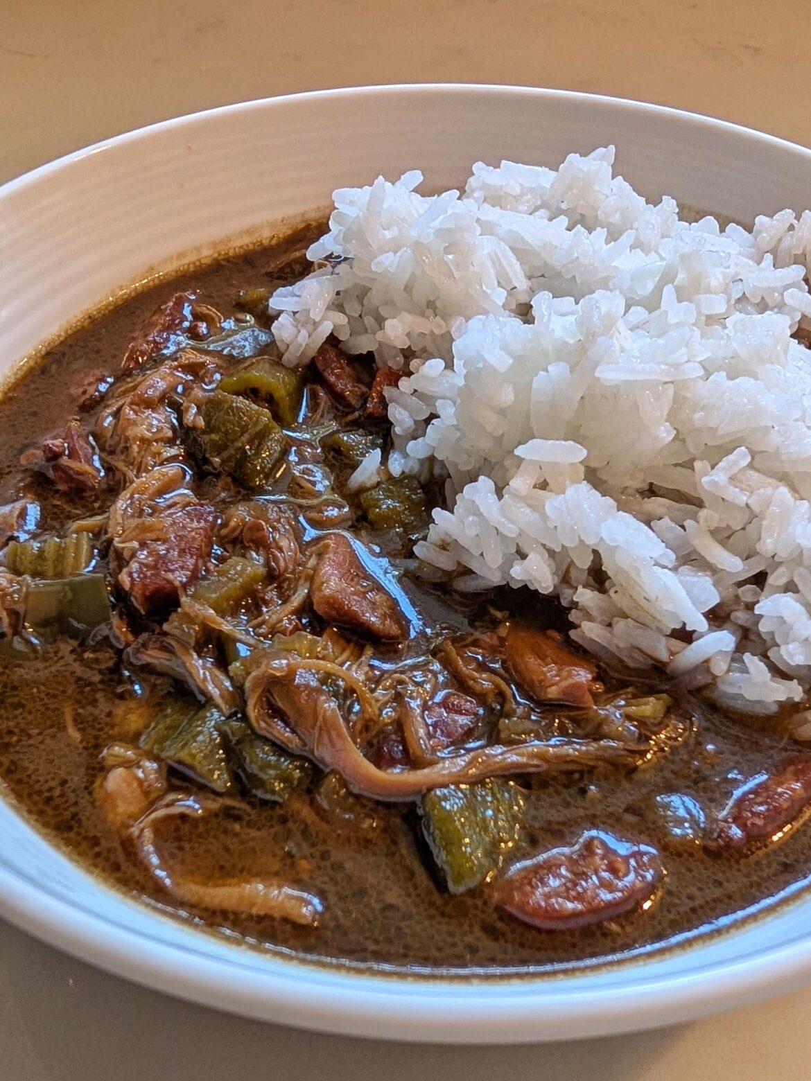 Never too hot to cook up a pot if chicken and sausage gumbo.