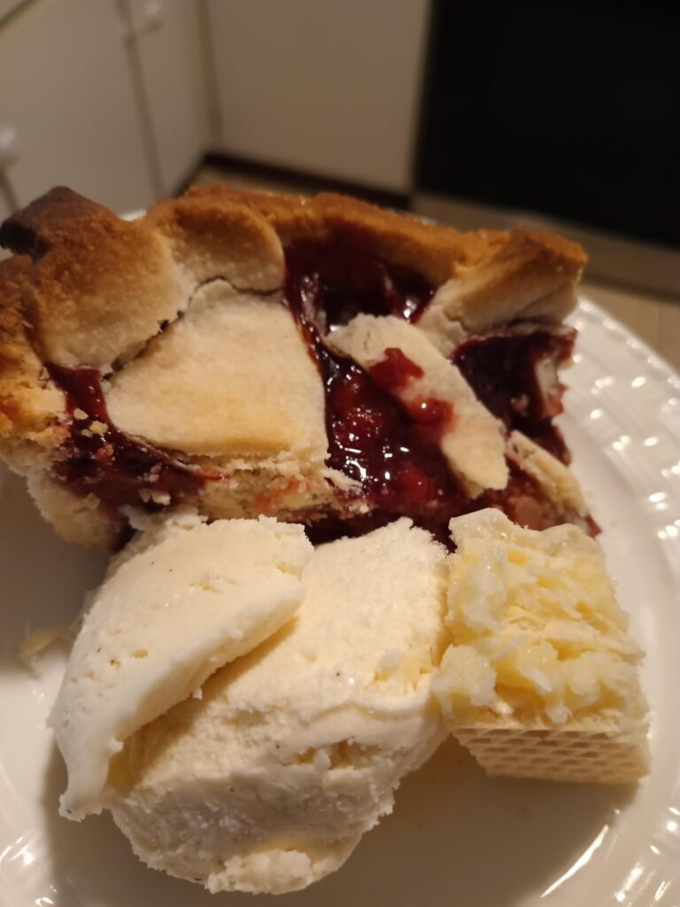 Strawberry/lard crust pie, vanilla ice cream and Rafaelo wafers made from scratch