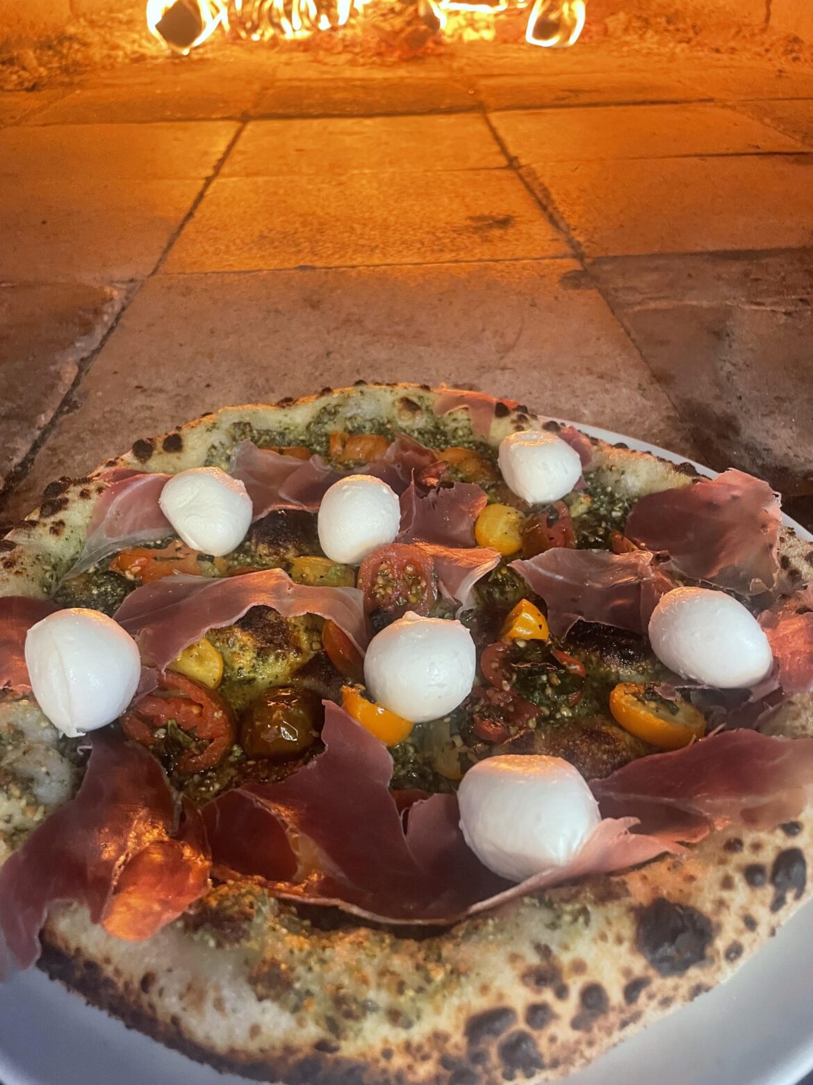 Pesto, datterini tomatoes, prosciutto & buffalo bocconcini !