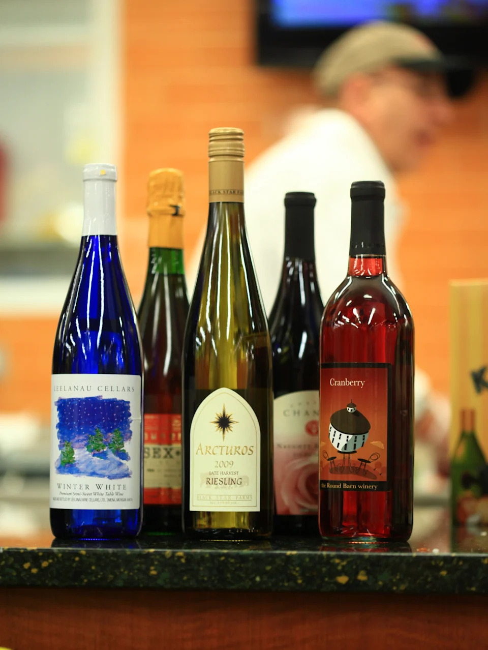 Michigan is the 4th largest grape-growing state in the country. Michigan wines from left to right: Leelanau Cellars' Winter White, M. Lawrence SEX Brut Rose by Mawby Vineyards, Black Star Farms winery Late Harvest Riesling, Chateau Chantal's Naughty Red and Cranberry wine from the Round Barn winery. Photo taken Tuesday, July 27, 2010.