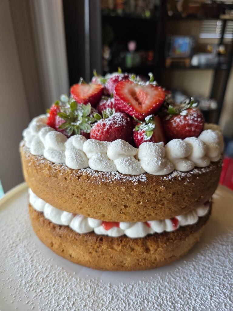 Strawberry cake with vanilla cream frosting