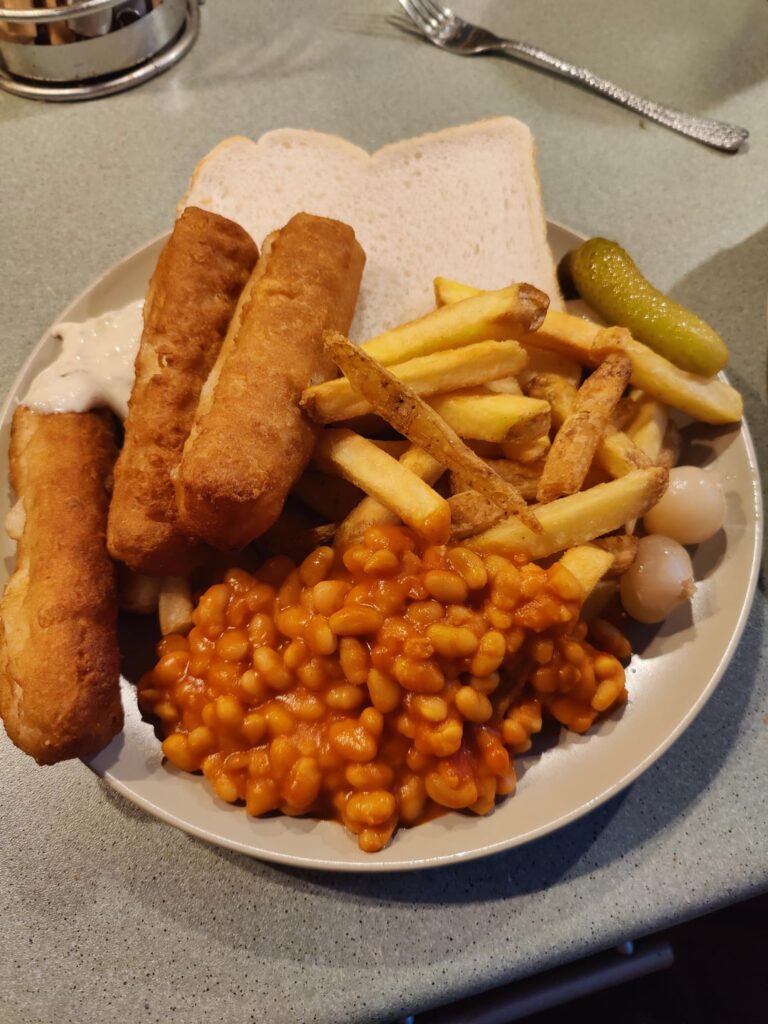 Jumbo fish fingers, skin on chips, and baked beans