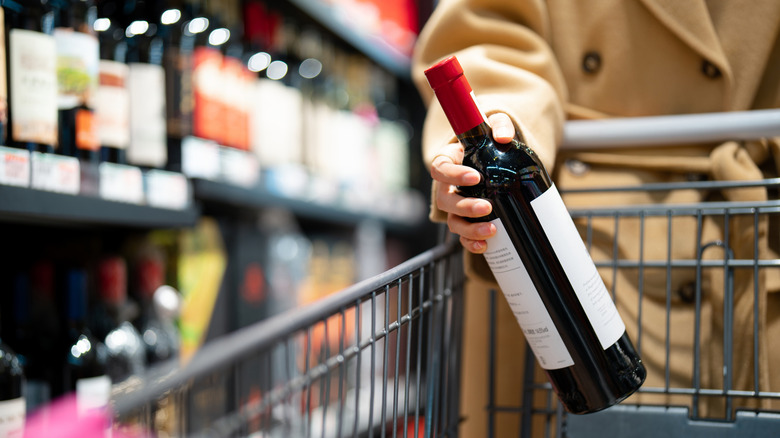 Bottle of wine in shopping cart