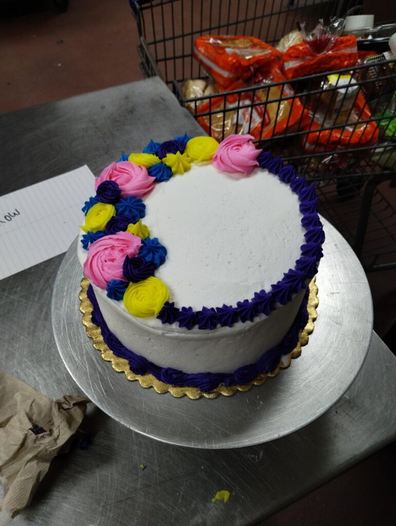 Had a trainer with me today, and she is encouraging me to make more trendy cakes. Here's the result.