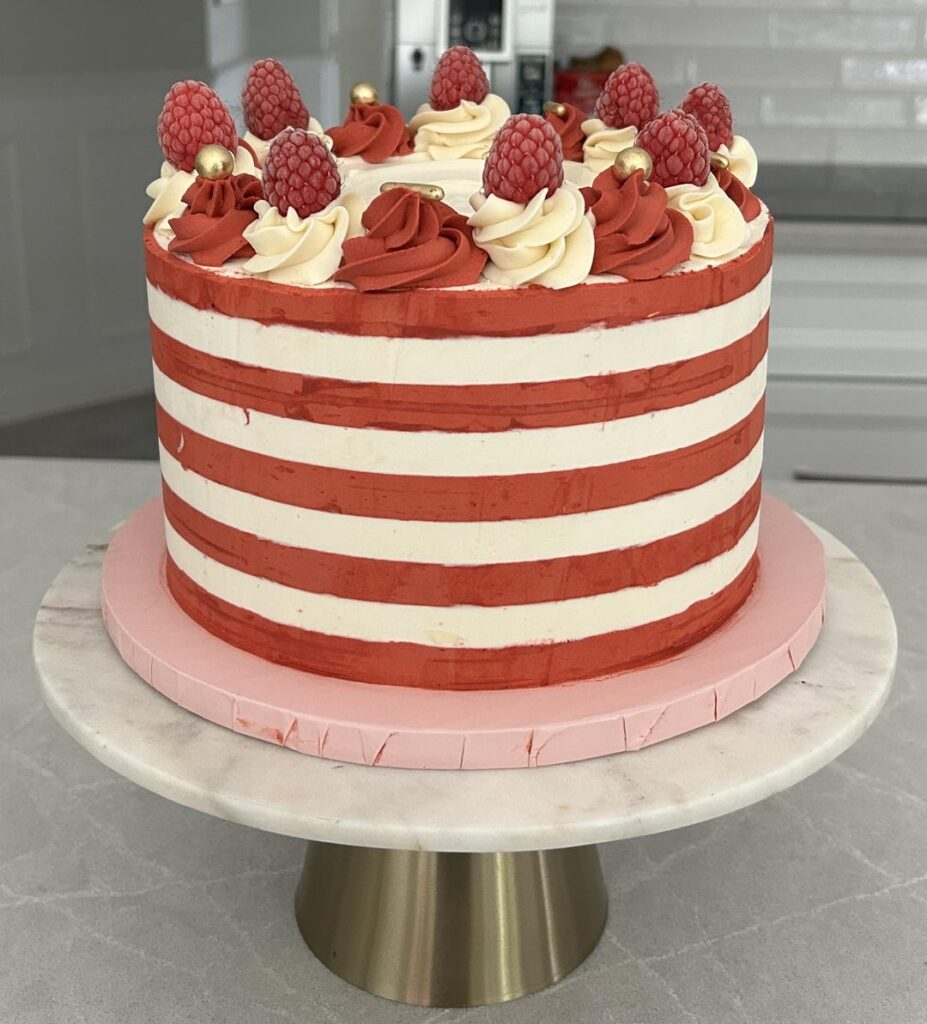 Raspberry and white chocolate cake I did for Canada day (recipe included!)