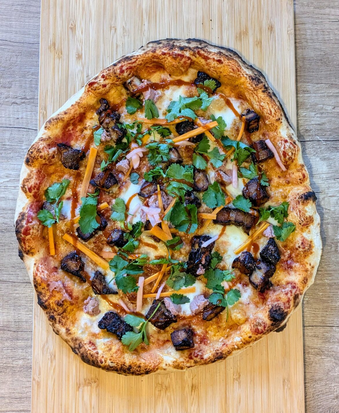 [OC] I recreated a Bánh Mì pizza that my local pizzeria does by making it at home from scratch.