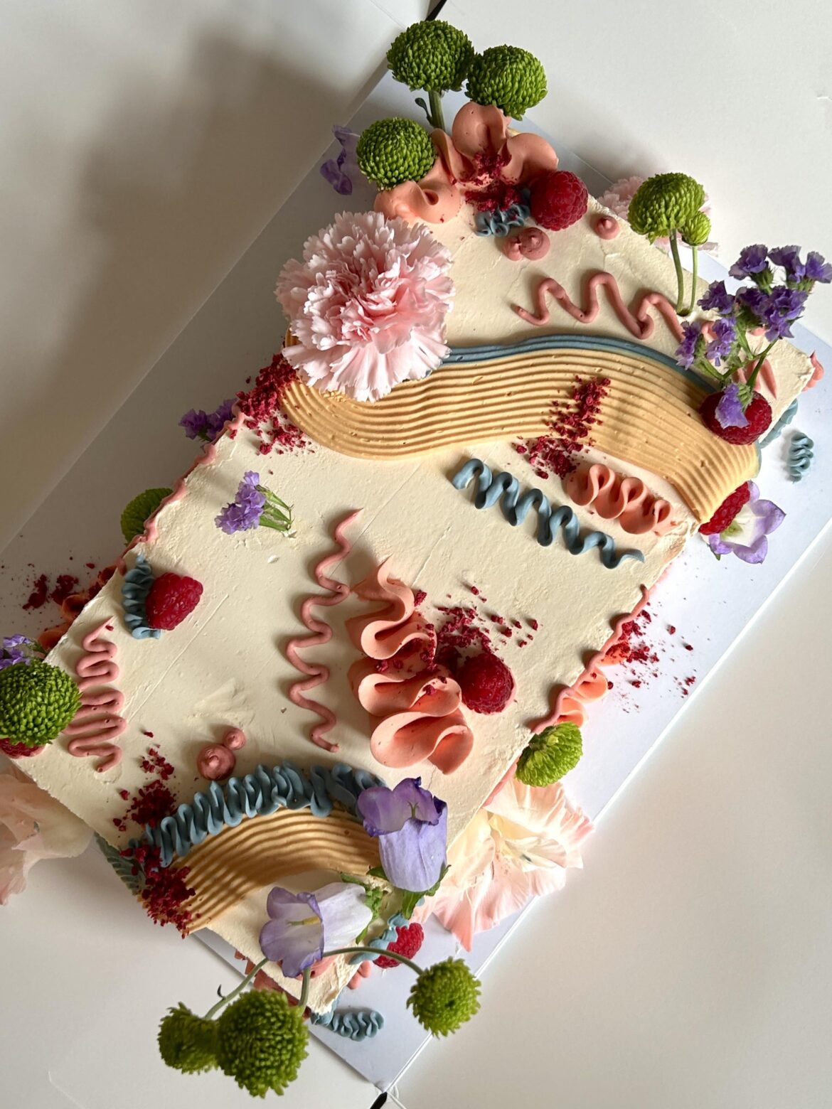 A very chaotic very fun very floral cake for a birthday