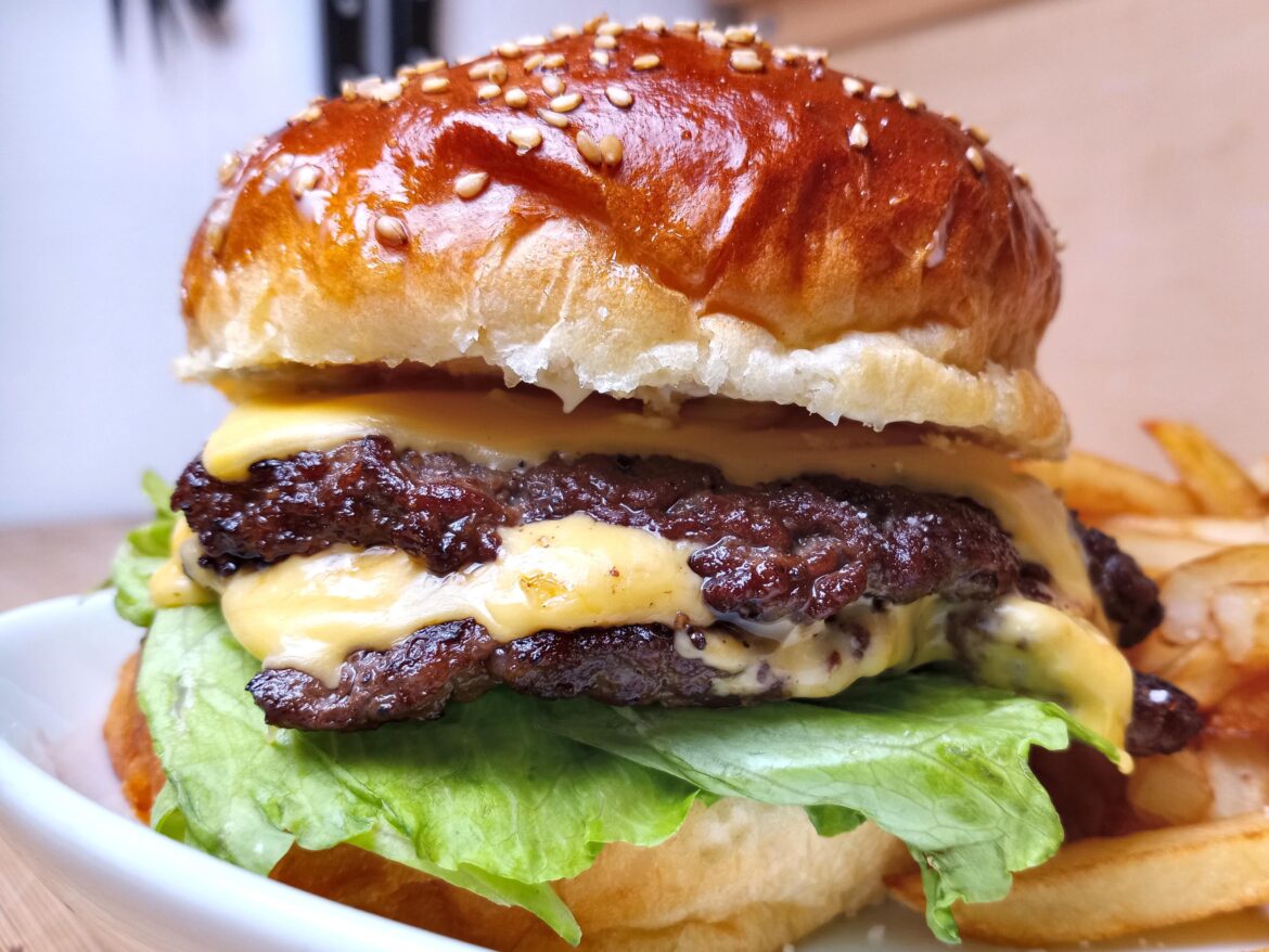 Double Cheeseburger on a homemade potato bun