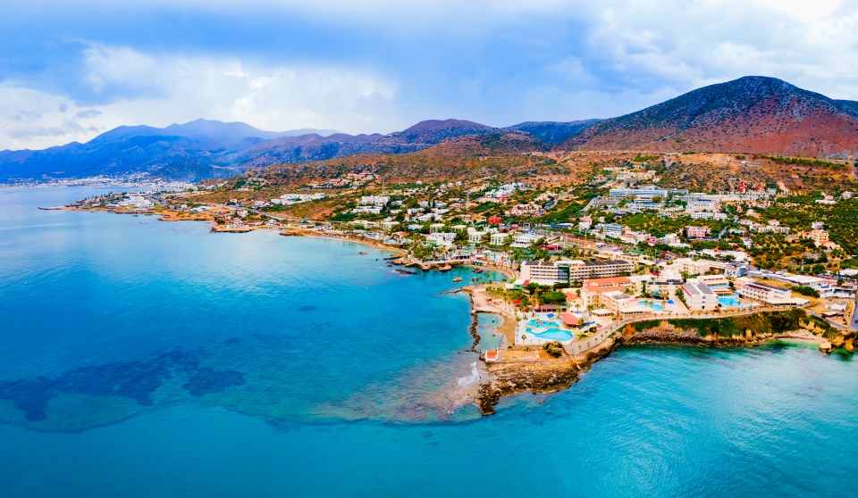 Aerial panoramic view of Hersonissos town on Crete, Greece.