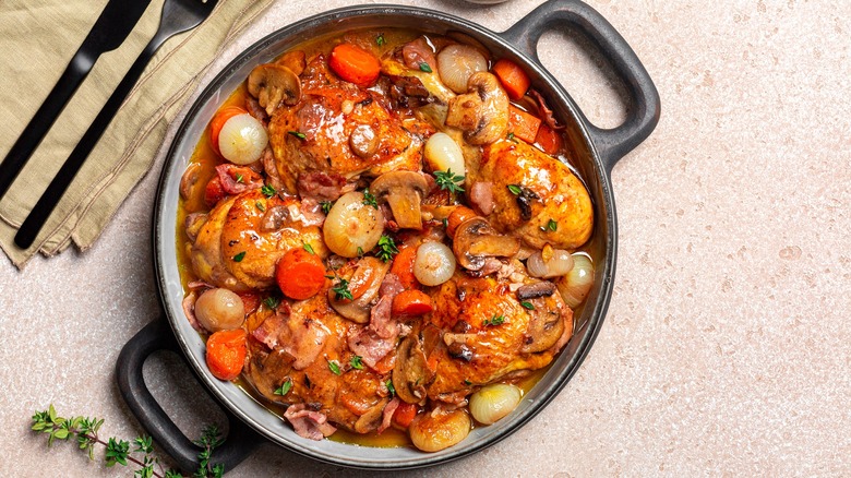 Freshly cooked coq au vin in a pot