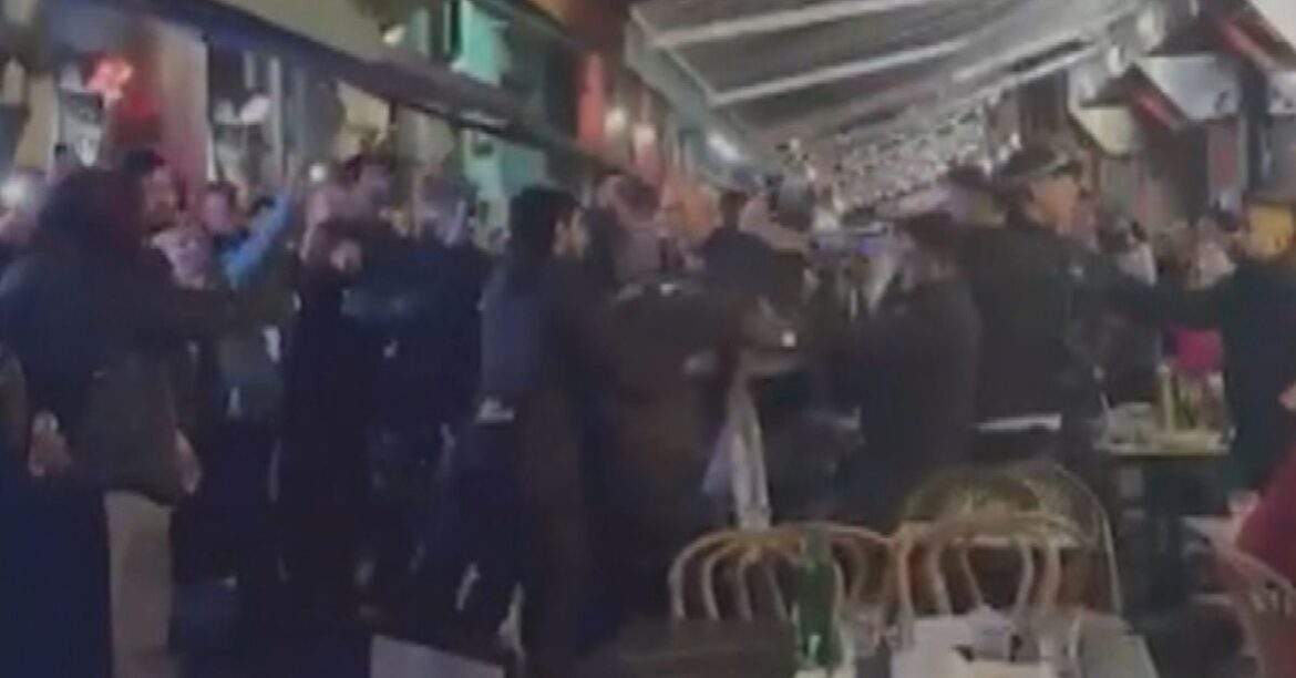 Three charged over alleged restaurant affray during Melbourne protest Three charged over alleged restaurant affray during Melbourne protest