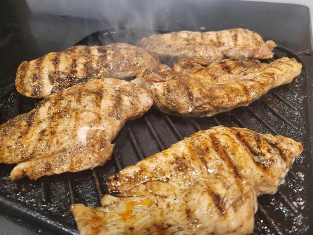 Cast iron grilled chicken breast w linguine and alfedo sauce