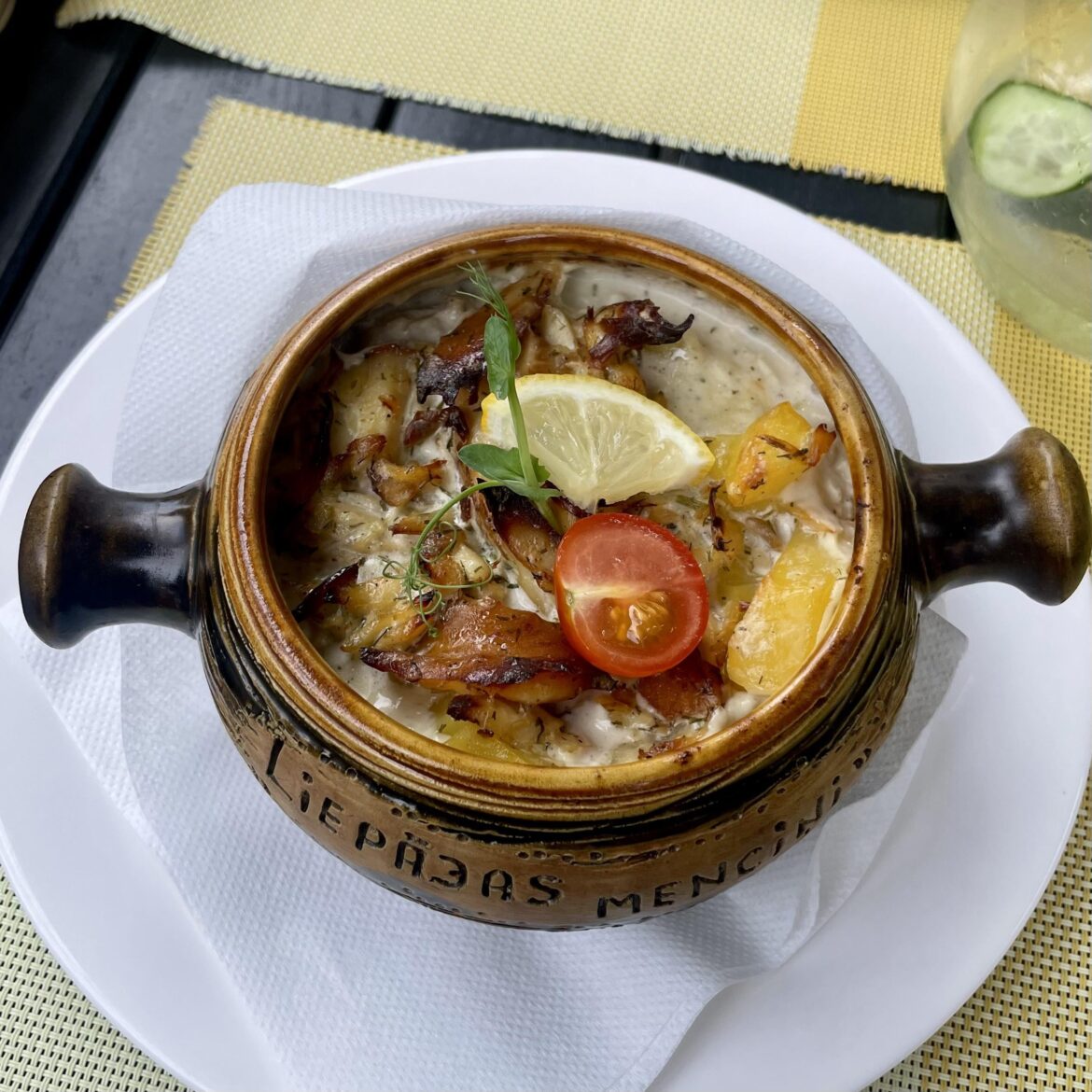 Liepājas menciņi - smoked cod fish and potatoes in sour cream in Liepāja, Latvia