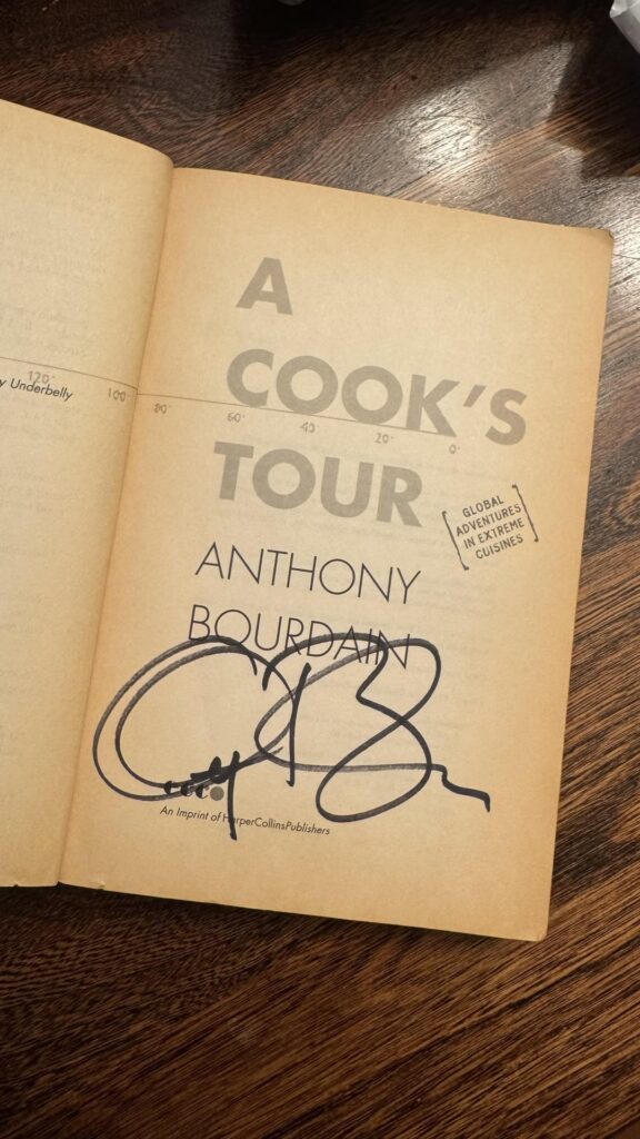 $8.50 thrift store find turns out to be signed first printing of Bourdain’s A Cook’s Tour