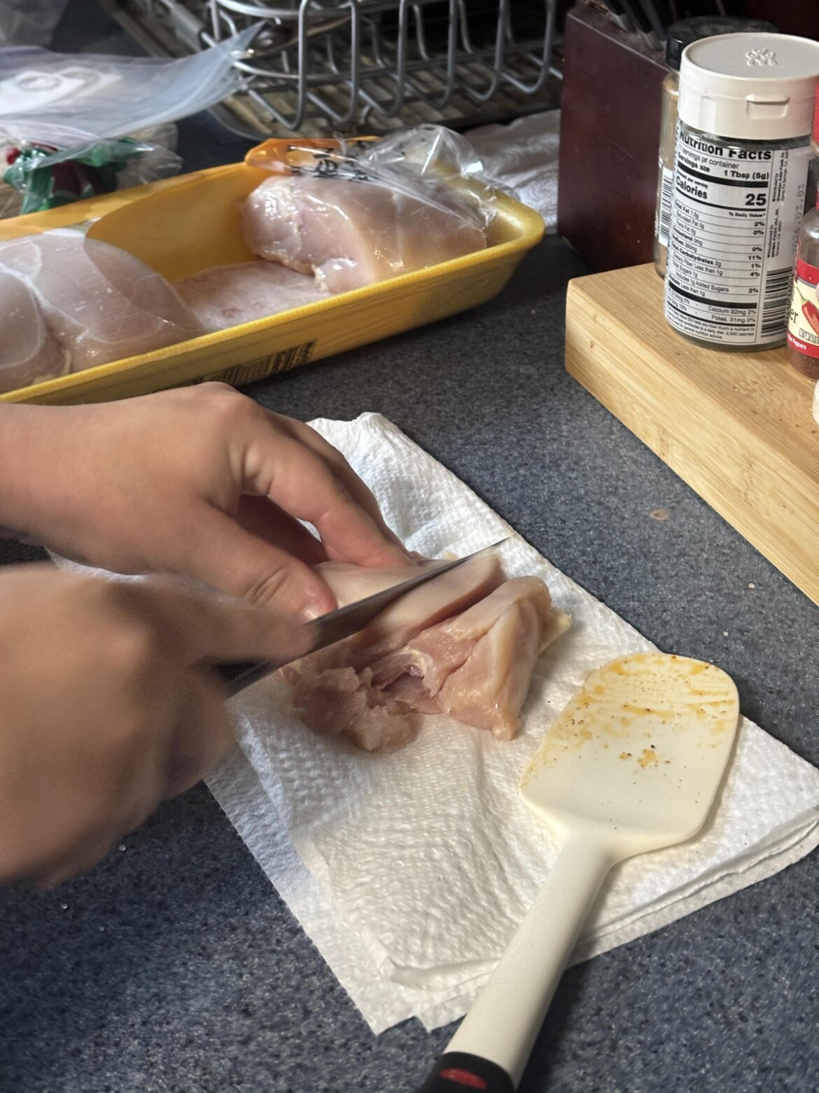My wife cuts meat on paper towels, help